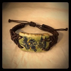 Handmade macrame and ceramic bracelet.